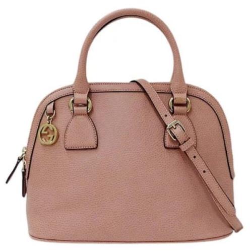 Brugt lyserød lædertaske