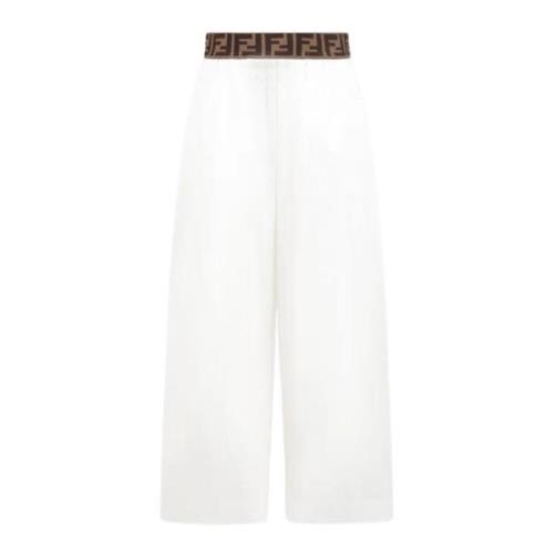 Hvide bukser med bredt ben og brun logo talje