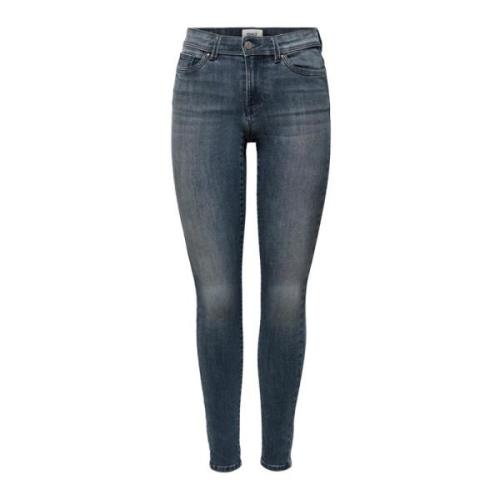 Blå ensfarvet jeans med lynlås og knaplukning til kvinder