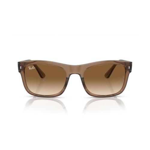 Rektangulære solbriller med gennemsigtig brun ramme og gradientbrune l...