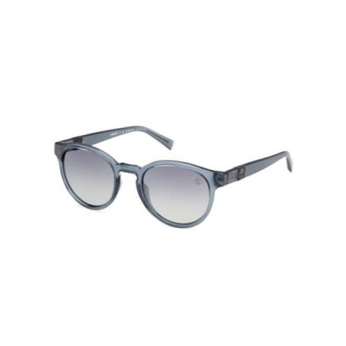 Polariserede solbriller Blå Transparent Rund Stil