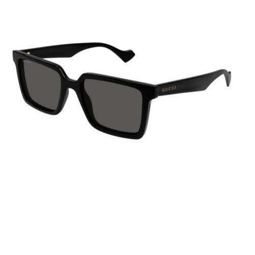 Stilfulde solbriller i sort med grå linser