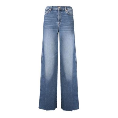 Moderne Flare Jeans med Frynset Kant