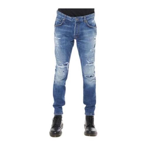 Slim fit jeans med flænger