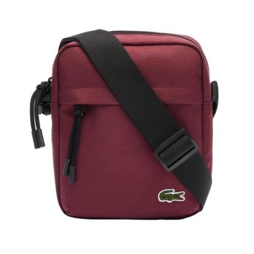 LACOSTE Skuldertaske  blodrød