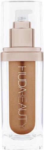 Huda Beauty N.Y.M.P.H. Body Glow 55 ml - Highlighter hos Magasin