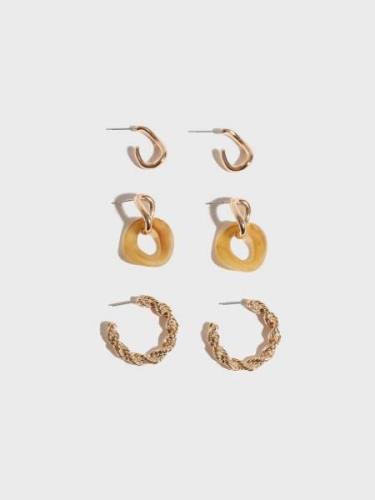 Nelly - Øreringe - Guld - Twisted Earrings - Smykker - Earrings
